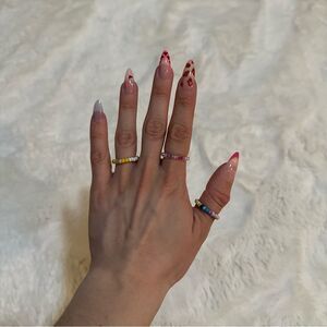 Bundle of three beaded rings